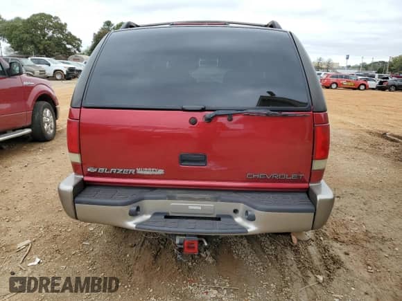 2000 Chevrolet Blazer LT with VIN 1GNCS13W3Y2213772, listed as a Copart auction lot 79964794 with 80,090 mi miles and Salvage title. Bid and sale history available at DreamBid. Image 6.