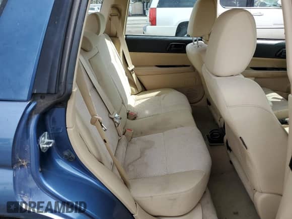 2008 Subaru Forester X z VIN JF1SG63668H718291, wystawiony jako Copart lot #70168015 z przebiegiem 196 508 mil mil oraz Szkoda całkowita • Salvage title. Historia ofert i sprzedaży dostępna na DreamBid. Obrazek 11.