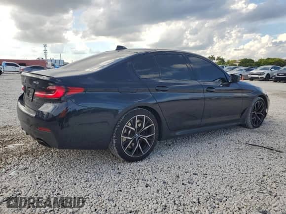 2023 BMW 5 Series 540i xDrive z VIN WBA73BJ00PWY18798, wystawiony jako Copart lot #72574454 z przebiegiem 26 445 mil mil oraz Szkoda całkowita • Salvage title. Historia ofert i sprzedaży dostępna na DreamBid. Obrazek 3.