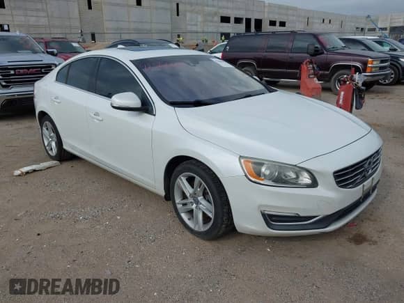 2015 Volvo S60 T5 Drive-E Premier with VIN YV126MFB8F1305105, listed as a IAAI auction lot 42566641 with 115,535 mi miles and . Bid and sale history available at DreamBid. Image 1.