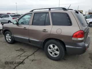 2005 Hyundai Santa Fe GLS с VIN KM8SC73DX5U975009, выставлен на аукционе Copart как лот 82798014 с пробегом 192 287 миль миль и Списание • Salvage title. История ставок и продаж доступна на DreamBid. Изображение 2.