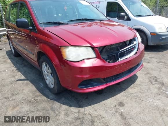 2014 Dodge Grand Caravan SE with VIN 2C4RDGBG5ER312293, listed as a IAAI auction lot 42592012 with 148,200 mi miles and . Bid and sale history available at DreamBid. Image 12.