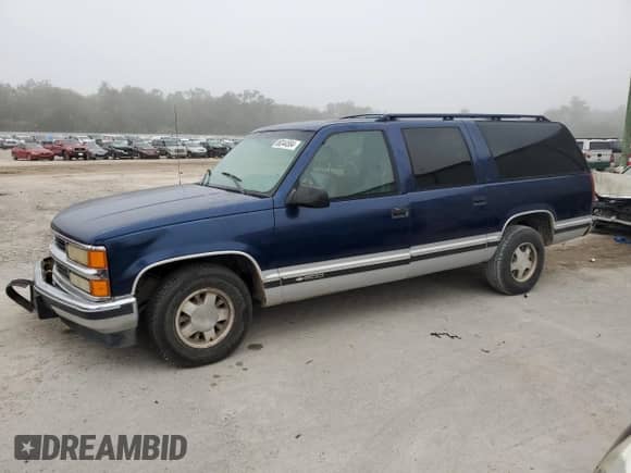 1996 Chevrolet Suburban с VIN 1GNEC16R8TJ359059, выставлен на аукционе Copart как лот 86344584 с пробегом 390 115 миль миль и Списание • Salvage title. История ставок и продаж доступна на DreamBid. Изображение 1.