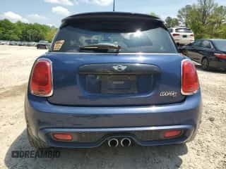 2015 MINI Hardtop S with VIN WMWXP7C54FT740648, listed as a Copart auction lot 55412595 with 51,810 mi miles and Salvage title. Bid and sale history available at DreamBid. Image 6.