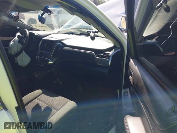 2015 Chevrolet Tahoe Commercial with VIN 1GNSK3ECXFR685336, listed as a IAAI auction lot 43053679 with 93,687 mi miles and . Bid and sale history available at DreamBid. Image 5.