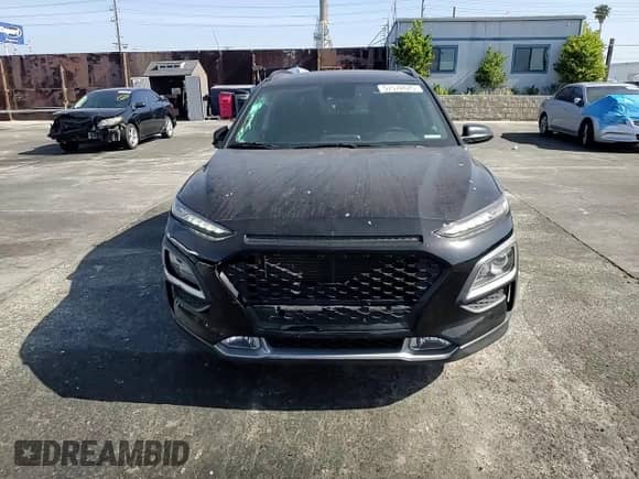 2020 Hyundai Kona SEL Plus z VIN KM8K62AA8LU451535, wystawiony jako Copart lot #57572625 z przebiegiem 56 669 mil mil oraz Szkoda całkowita • Salvage title. Historia ofert i sprzedaży dostępna na DreamBid. Obrazek 13.