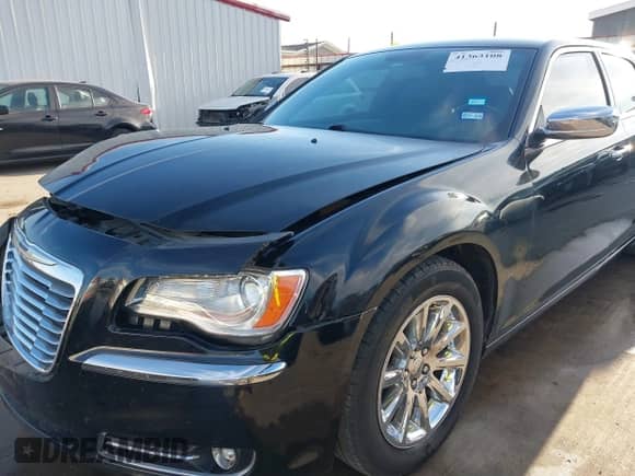 2014 Chrysler 300 C with VIN 2C3CCAEGXEH380004, listed as a IAAI auction lot 41363108 with 95,440 mi miles and . Bid and sale history available at DreamBid. Image 19.