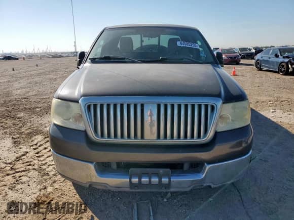 2005 Ford F-150 STX with VIN 1FTRX12W65NA22170, listed as a Copart auction lot 84585255 with 164,645 mi miles and Salvage title. Bid and sale history available at DreamBid. Image 5.
