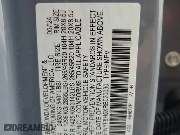 2024 Honda Passport EX-L with VIN 5FNYF8H5XRB020030, listed as a Copart auction lot 58777515 with 12,508 mi miles and Salvage title. Bid and sale history available at DreamBid. Image 13.