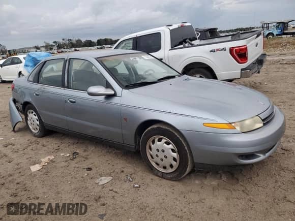 2002 Saturn LS with VIN 1G8JU54F82Y567169, listed as a Copart auction lot 73280794 with 53,894 mi miles and Salvage title. Bid and sale history available at DreamBid. Image 4.