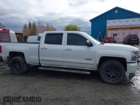2017 Chevrolet Silverado 1500 High Country with VIN 3GCUKTEJ0HG169649, listed as a IAAI auction lot 43232379 with Not provided miles and . Bid and sale history available at DreamBid. Image 13.