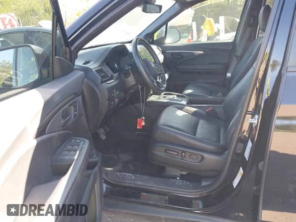 2022 Honda Passport EX-L with VIN 5FNYF7H57NB004890, listed as a IAAI auction lot 42032854 with 53,642 mi miles and . Bid and sale history available at DreamBid. Image 5.