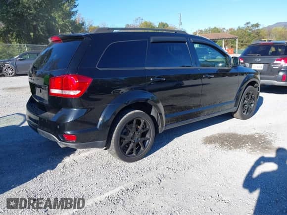 2015 Dodge Journey SXT with VIN 3C4PDCBG7FT583547, listed as a IAAI auction lot 43438520 with 144,178 mi miles and . Bid and sale history available at DreamBid. Image 4.