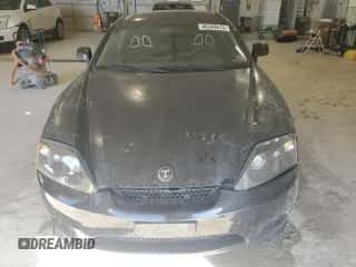 2006 Hyundai Tiburon GT с VIN KMHHN65F06U191744, выставлен на аукционе Copart как лот 46345615 с пробегом 150 340 миль миль и Списание • Salvage title. История ставок и продаж доступна на DreamBid. Изображение 5.