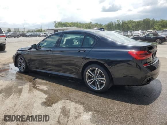 2019 BMW 7 Series 750i xDrive с VIN WBA7F2C55KB240701, выставлен на аукционе Copart как лот 61533285 с пробегом 82 722 миль миль и Списание • Salvage title. История ставок и продаж доступна на DreamBid. Изображение 2.