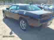 2021 Dodge Challenger SXT с VIN 2C3CDZGG0MH560955, выставлен на аукционе IAAI как лот 42030769 с пробегом 78 790 миль миль и . История ставок и продаж доступна на DreamBid. Изображение 3.