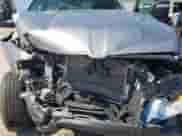 2025 Ram 1500 Tradesman with VIN 1C6RRFGGXSN674348, listed as a Copart auction lot 62982755 with 10,596 mi miles and Salvage title. Bid and sale history available at DreamBid. Image 12.