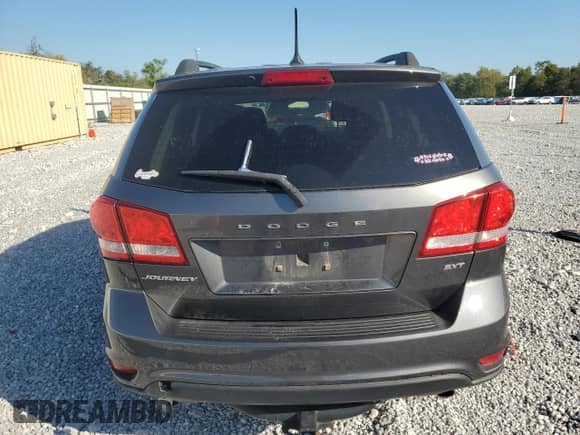 2014 Dodge Journey SXT with VIN 3C4PDCBG9ET142064, listed as a Copart auction lot 84588885 with 168,463 mi miles and Salvage title. Bid and sale history available at DreamBid. Image 6.