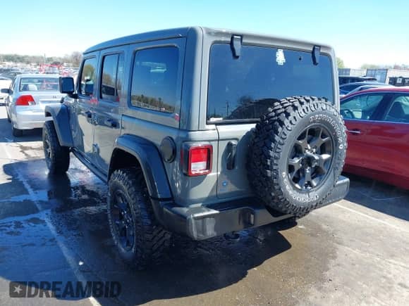 2022 Jeep Wrangler Unlimited Sport S z VIN 1C4HJXDG1NW200793, wystawiony jako IAAI lot #41810817 z przebiegiem 35 212 mil mil oraz . Historia ofert i sprzedaży dostępna na DreamBid. Obrazek 3.