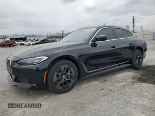 2024 BMW i4 eDrive35 with VIN WBY43AW05RFS57427, listed as a Copart auction lot 65464855 with 7,096 mi miles and Salvage title. Bid and sale history available at DreamBid. Image 1.