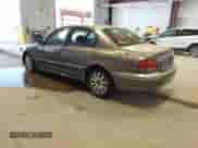 2004 Hyundai Sonata GLS z VIN KMHWF35H34A969232, wystawiony jako IAAI lot #43543635 z przebiegiem 142 476 mil mil oraz . Historia ofert i sprzedaży dostępna na DreamBid. Obrazek 3.