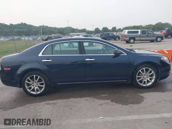 2012 Chevrolet Malibu LTZ 1LZ z VIN 1G1ZE5E08CF264561, wystawiony jako IAAI lot #43153788 z przebiegiem 160 864 mil mil oraz . Historia ofert i sprzedaży dostępna na DreamBid. Obrazek 13.