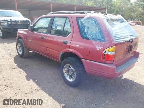 1998 Honda Passport LX with VIN 4S6CK58W6W4420329, listed as a IAAI auction lot 43410300 with 214,614 mi miles and . Bid and sale history available at DreamBid. Image 3.
