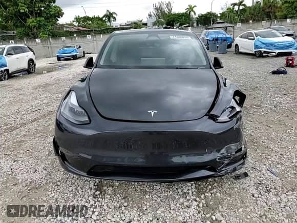 2024 Tesla Model Y с VIN 7SAYGDED6RF018828, выставлен на аукционе Copart как лот 71609855 с пробегом 21 820 миль миль и На запчасти • Non repairable. История ставок и продаж доступна на DreamBid. Изображение 13.