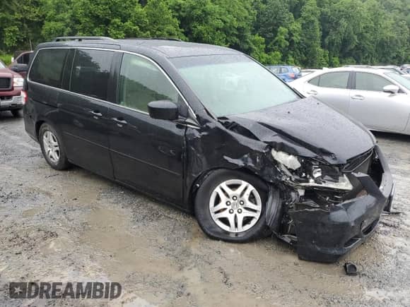 2007 Honda Odyssey EX-L с VIN 5FNRL38717B129569, выставлен на аукционе Copart как лот 61364905 с пробегом 107 990 миль миль и Списание • Salvage title. История ставок и продаж доступна на DreamBid. Изображение 4.