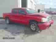 2005 Dodge Dakota SLT with VIN 1D7HE48N65S275384, listed as a IAAI auction lot 37842815 with Not provided miles and . Bid and sale history available at DreamBid. Image 1.