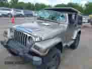 2004 Jeep Wrangler Sahara с VIN 1J4FA59S54P740417, выставлен на аукционе IAAI как лот 42382078 с пробегом 200 108 миль миль и . История ставок и продаж доступна на DreamBid. Изображение 6.