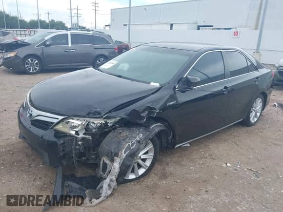 2014 Toyota Camry LE z VIN 4T1BD1FK5EU104233, wystawiony jako IAAI lot #42582088 z przebiegiem 175 975 mil mil oraz . Historia ofert i sprzedaży dostępna na DreamBid. Obrazek 17.