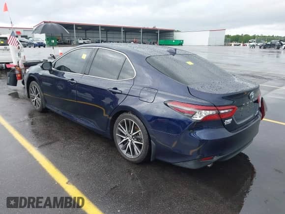 2021 Toyota Camry Hybrid XLE with VIN 4T1F31AK4MU546558, listed as a IAAI auction lot 42235763 with 62,299 mi miles and . Bid and sale history available at DreamBid. Image 3.