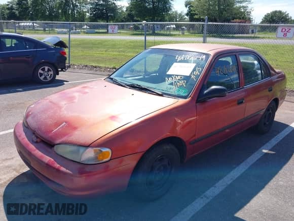 2002 Chevrolet Prizm z VIN 1Y1SK528X2Z415680, wystawiony jako IAAI lot #42782649 z przebiegiem Nie podano mil oraz . Historia ofert i sprzedaży dostępna na DreamBid. Obrazek 13.
