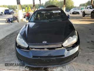 2008 Hyundai Tiburon GS с VIN KMHHM66D08U296058, выставлен на аукционе Copart как лот 73865304 с пробегом 95 910 миль миль и Чистый • Clean title. История ставок и продаж доступна на DreamBid. Изображение 5.
