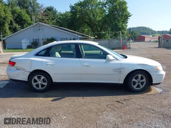 2007 Hyundai Azera GLS z VIN KMHFC46D67A189479, wystawiony jako IAAI lot #42641536 z przebiegiem 127 281 mil mil oraz . Historia ofert i sprzedaży dostępna na DreamBid. Obrazek 13.
