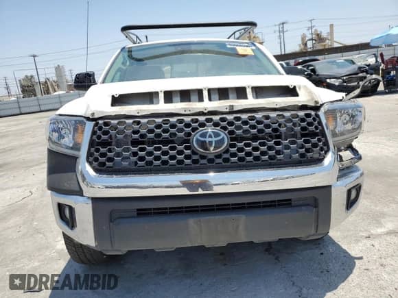 2019 Toyota Tundra SR с VIN 5TFRM5F14KX143150, выставлен на аукционе Copart как лот 63068995 с пробегом Не указан миль и Списание • Salvage title. История ставок и продаж доступна на DreamBid. Изображение 5.
