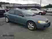 2005 Dodge Stratus SXT with VIN 1B3EL46T25N633939, listed as a Copart auction lot 71744064 with 197,696 mi miles and Salvage title. Bid and sale history available at DreamBid. Image 4.