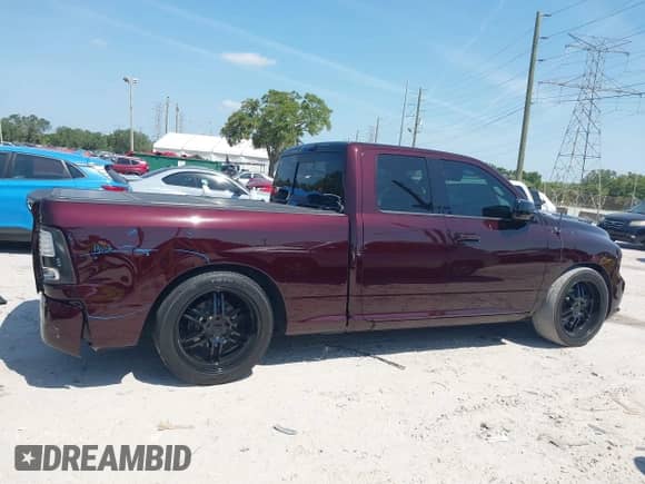 2014 Ram 1500 Sport with VIN 1C6RR6HT5ES458201, listed as a IAAI auction lot 42082640 with 97,730 mi miles and . Bid and sale history available at DreamBid. Image 13.