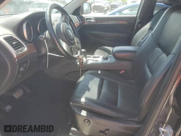 2013 Jeep Grand Cherokee Limited with VIN 1C4RJFBG5DC629923, listed as a Copart auction lot 66639035 with 136,993 mi miles and Salvage title. Bid and sale history available at DreamBid. Image 7.