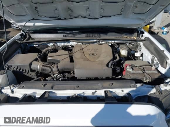 2021 Toyota Tacoma SR5 z VIN 3TMAZ5CN7MM144212, wystawiony jako IAAI lot #41707150 z przebiegiem 75 113 mil mil oraz . Historia ofert i sprzedaży dostępna na DreamBid. Obrazek 10.