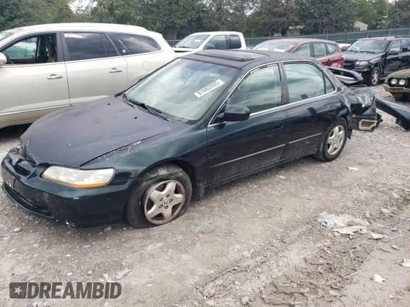 1999 Honda Accord EX z VIN 1HGCG1654XA001479, wystawiony jako Copart lot #81662695 z przebiegiem 218 789 mil mil oraz Szkoda całkowita • Salvage title. Historia ofert i sprzedaży dostępna na DreamBid. Obrazek 1.