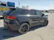 2016 Jeep Grand Cherokee SRT z VIN 1C4RJFDJ3GC454648, wystawiony jako Copart lot #57988235 z przebiegiem 104 364 mil mil oraz Szkoda całkowita • Salvage title. Historia ofert i sprzedaży dostępna na DreamBid. Obrazek 3.