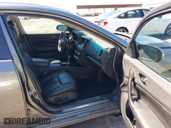 2014 Nissan Maxima SV with VIN 1N4AA5AP9EC471554, listed as a IAAI auction lot 43150248 with 102,187 mi miles and . Bid and sale history available at DreamBid. Image 5.