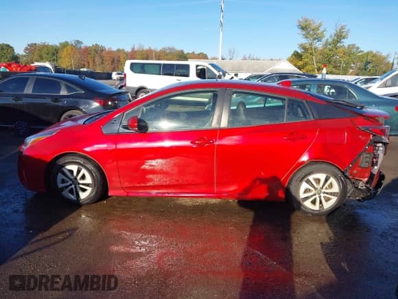 2016 Toyota Prius Three z VIN JTDKARFUXG3517545, wystawiony jako IAAI lot #43457481 z przebiegiem 77 044 mil mil oraz . Historia ofert i sprzedaży dostępna na DreamBid. Obrazek 14.