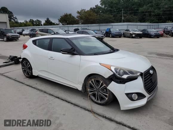 2016 Hyundai Veloster Turbo с VIN KMHTC6AE9GU293039, выставлен на аукционе Copart как лот 69986755 с пробегом 93 522 миль миль и Списание • Salvage title. История ставок и продаж доступна на DreamBid. Изображение 4.
