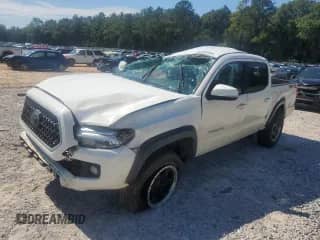 2019 Toyota Tacoma TRD Off Road with VIN 3TMCZ5AN9KM282522, listed as a Copart auction lot 85939905 with 89,447 mi miles and Non repairable. Bid and sale history available at DreamBid. Image 1.