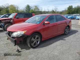 2014 Toyota Camry SE with VIN 4T1BK1FK9EU539942, listed as a Copart auction lot 84392665 with 189,692 mi miles and Salvage title. Bid and sale history available at DreamBid. Image 1.
