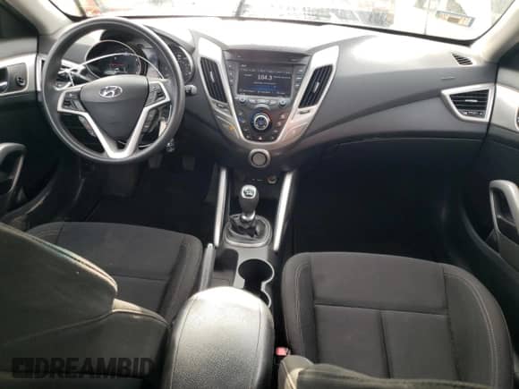 2013 Hyundai Veloster w/Gray Int z VIN KMHTC6AD5DU136899, wystawiony jako Copart lot #66874144 z przebiegiem 89 446 mil mil oraz Szkoda całkowita • Salvage title. Historia ofert i sprzedaży dostępna na DreamBid. Obrazek 8.