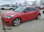 2015 Hyundai Veloster z VIN KMHTC6AD4FU229741, wystawiony jako Copart lot #44585985 z przebiegiem 124 790 mil mil oraz Czysty tytuł • Clean title. Historia ofert i sprzedaży dostępna na DreamBid. Obrazek 1.